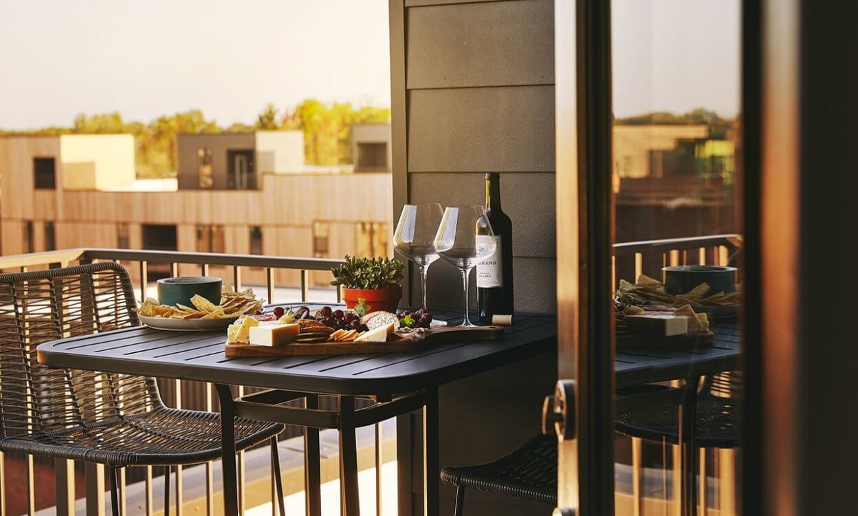 outdoor food spread with wine on patio
