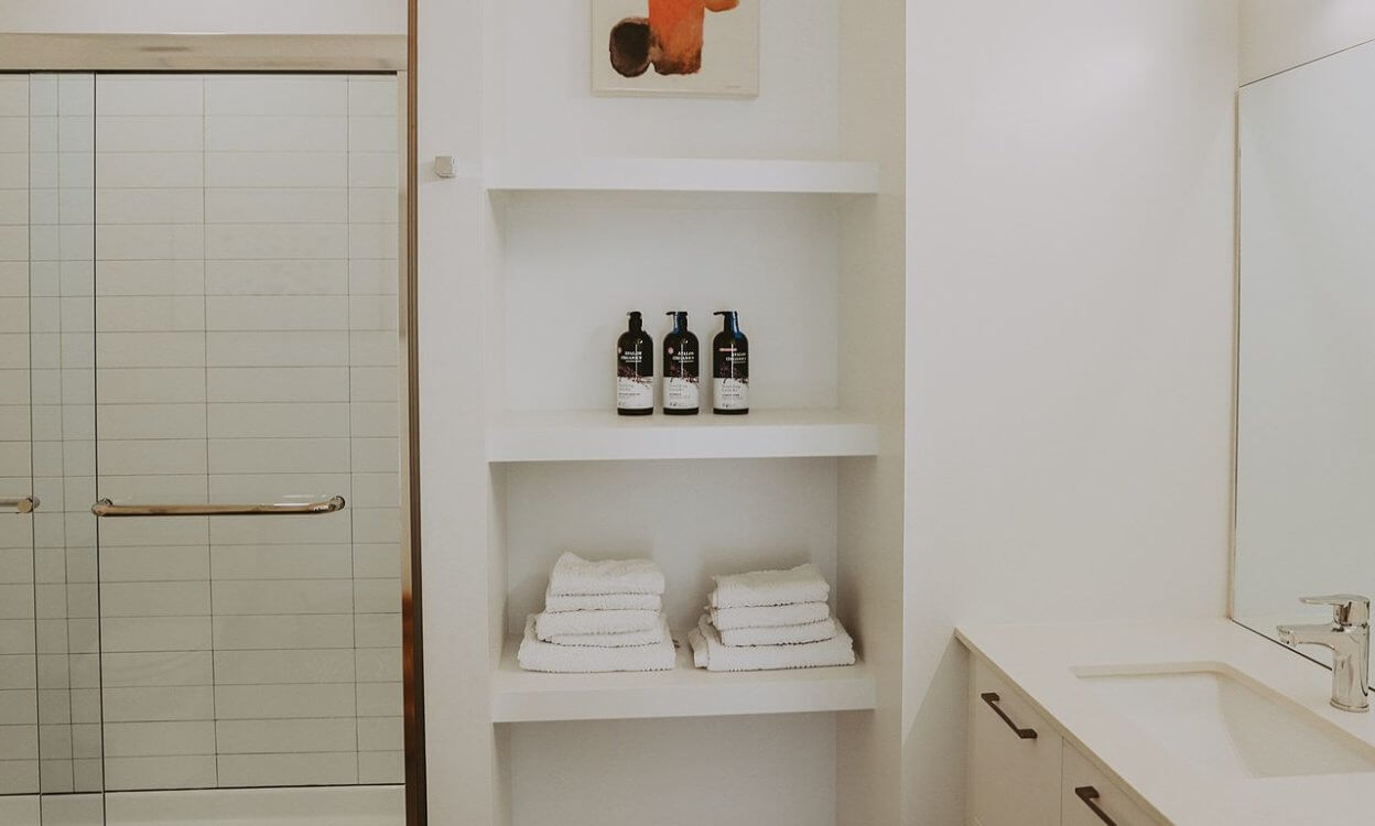 Bathroom with built in shelves