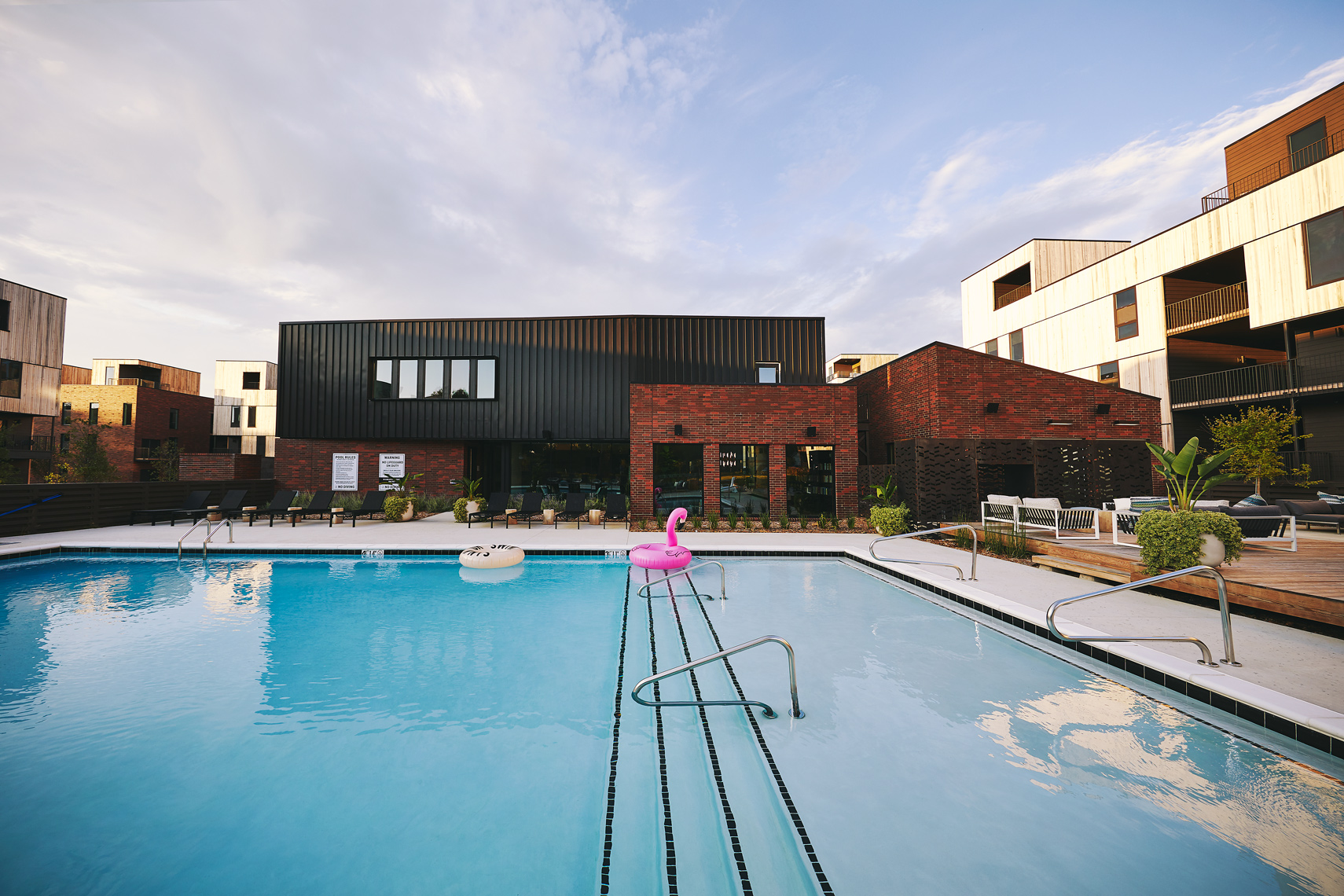 poolside with splash area brick avenue lofts bentonville apartments