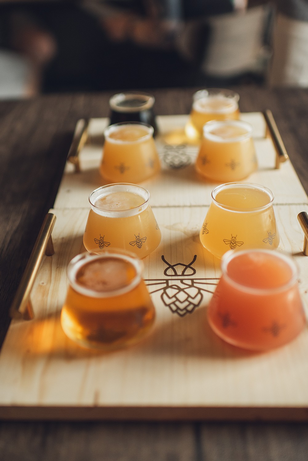 social project brewing flight of beers in bee designed cups